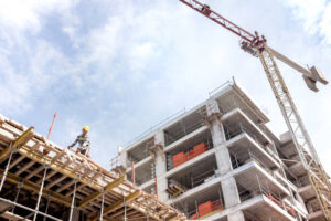 A new building is being constructed with use of tower crane